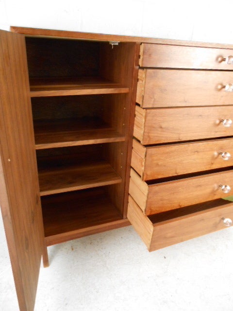 Walnut six drawer chifferobe with three adjustable shelves lucite drawer pulls.