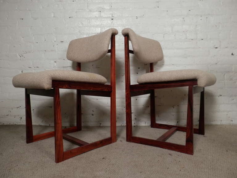 Set of six comfortable chairs in exceptional Brazilian rosewood with soft seat and back cushions. Vintage midcentury 