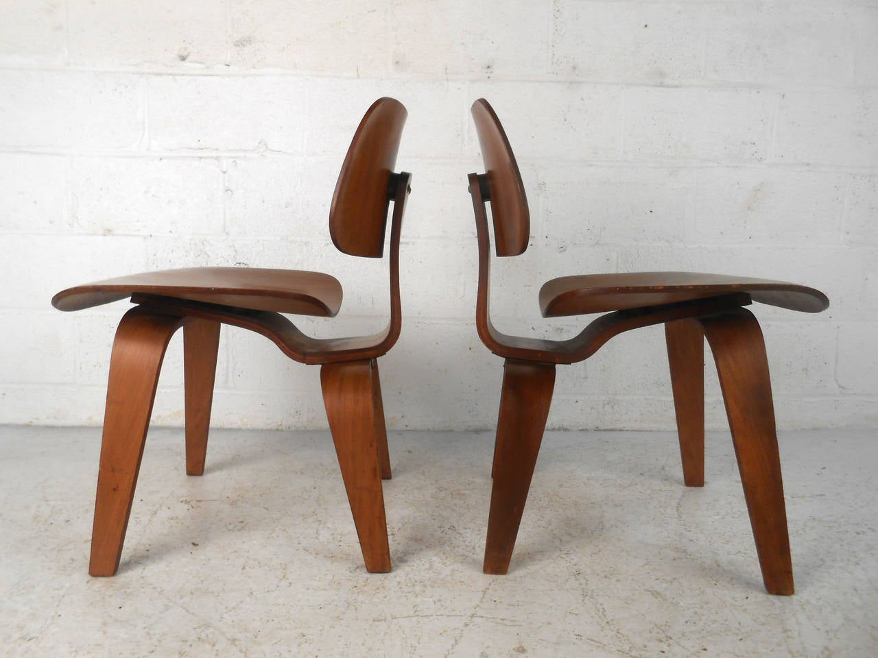 Pair of Ray and Charles Eames DCW Side Chairs In Fair Condition In Brooklyn, NY