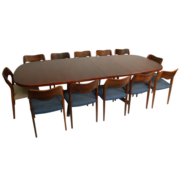 The table is solid rosewood construction with a rich, dark grain. There are two 19
