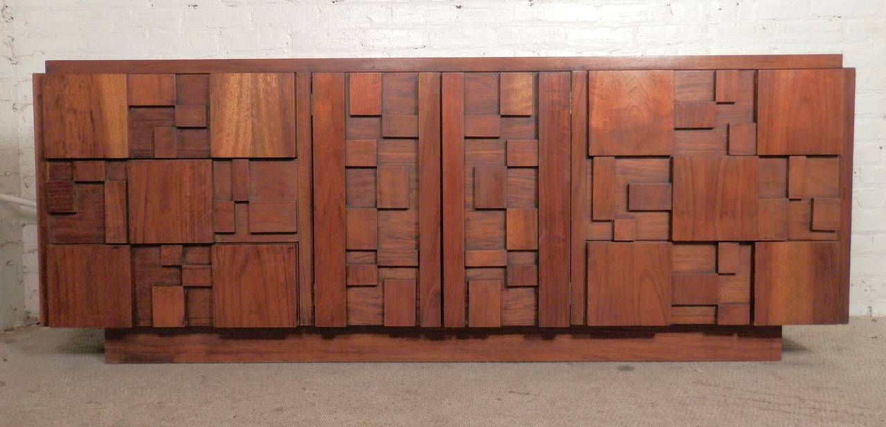 Excellent vintage dresser with patchwork motif throughout. Nine drawers, walnut grain with block pattern across the front.

(Please confirm item location - NY or NJ - with dealer)