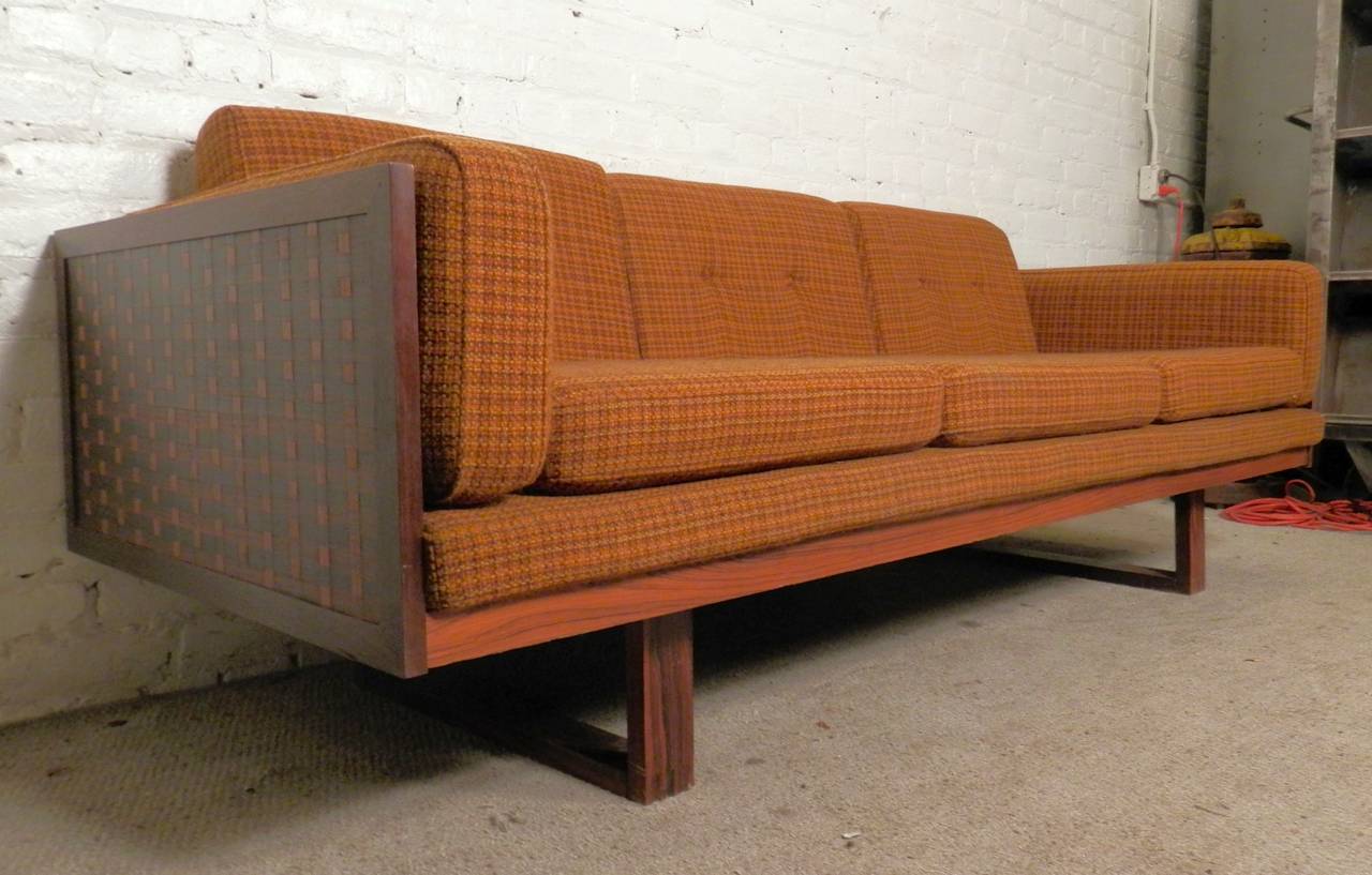 Wonderful vintage modern sofa by Poul Cadovius for France & Son. Great weave style around the entire back and sides, dovetailed sled legs, thick comfortable cushions.

(Please confirm item location - NY or NJ - with dealer)