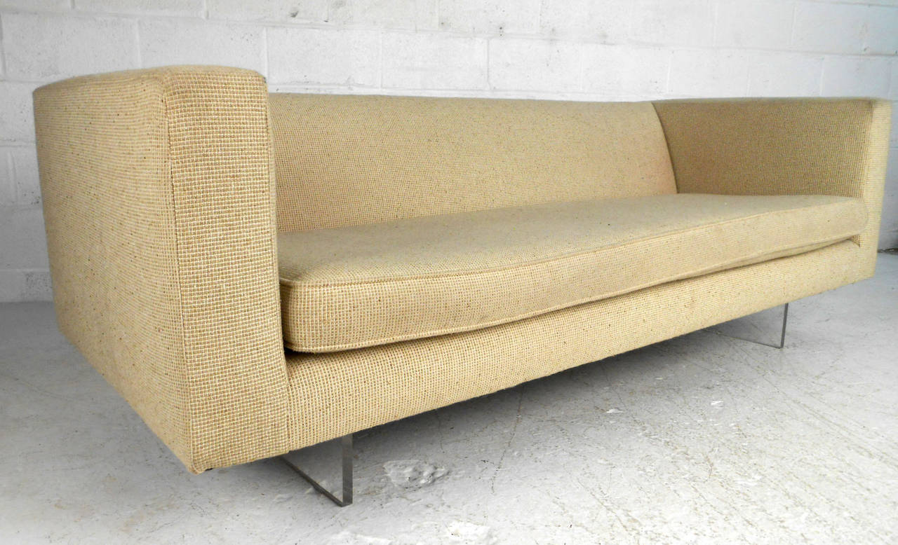 This gorgeous mid-century Harvey Probber style sofa makes a stylish and comfortable addition to any room. Unique Lucite legs add to the simplistic modern feel of the piece. Please confirm item location (NY or NJ).