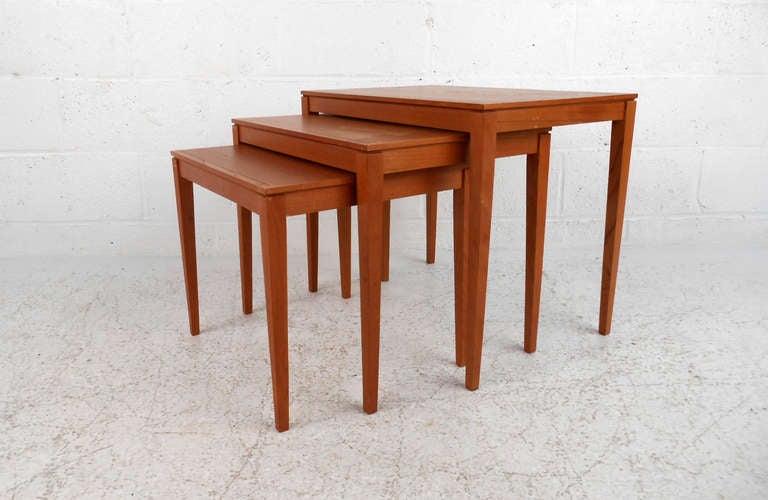 This set of mid-century nesting tables by Bent Silberg Mobler make a stylish and versatile addition to home or office. These tables are in good structural condition but refinishing is recommended. Please confirm item location (NY or NJ).