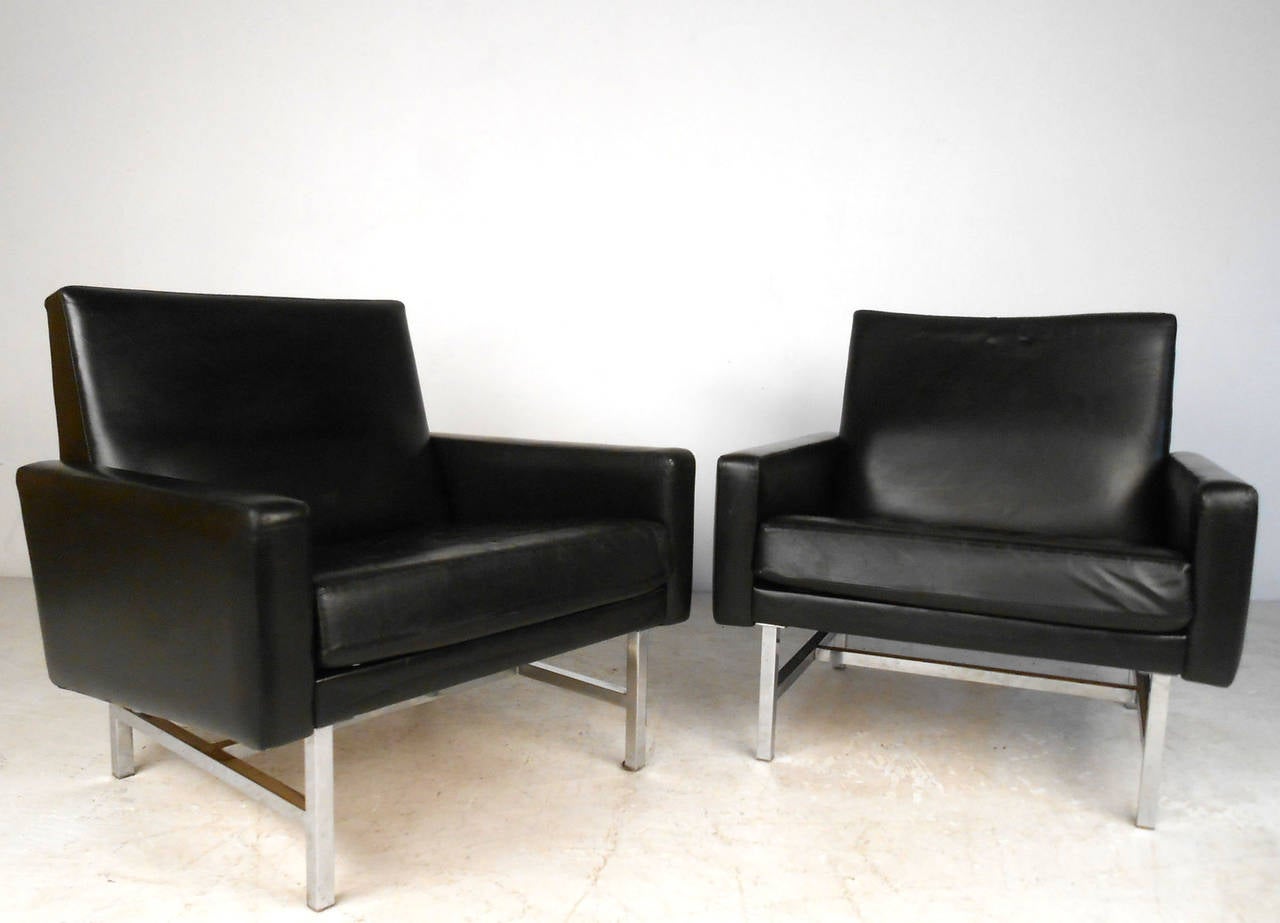 This beautiful pair of chrome base leather lounge chairs by Thonet offer exquisite Mid-Century style suitable for almost any seating situation. Sturdy stretchers and vintage leather compliment the wonderful shape and comfort of the chairs. Please