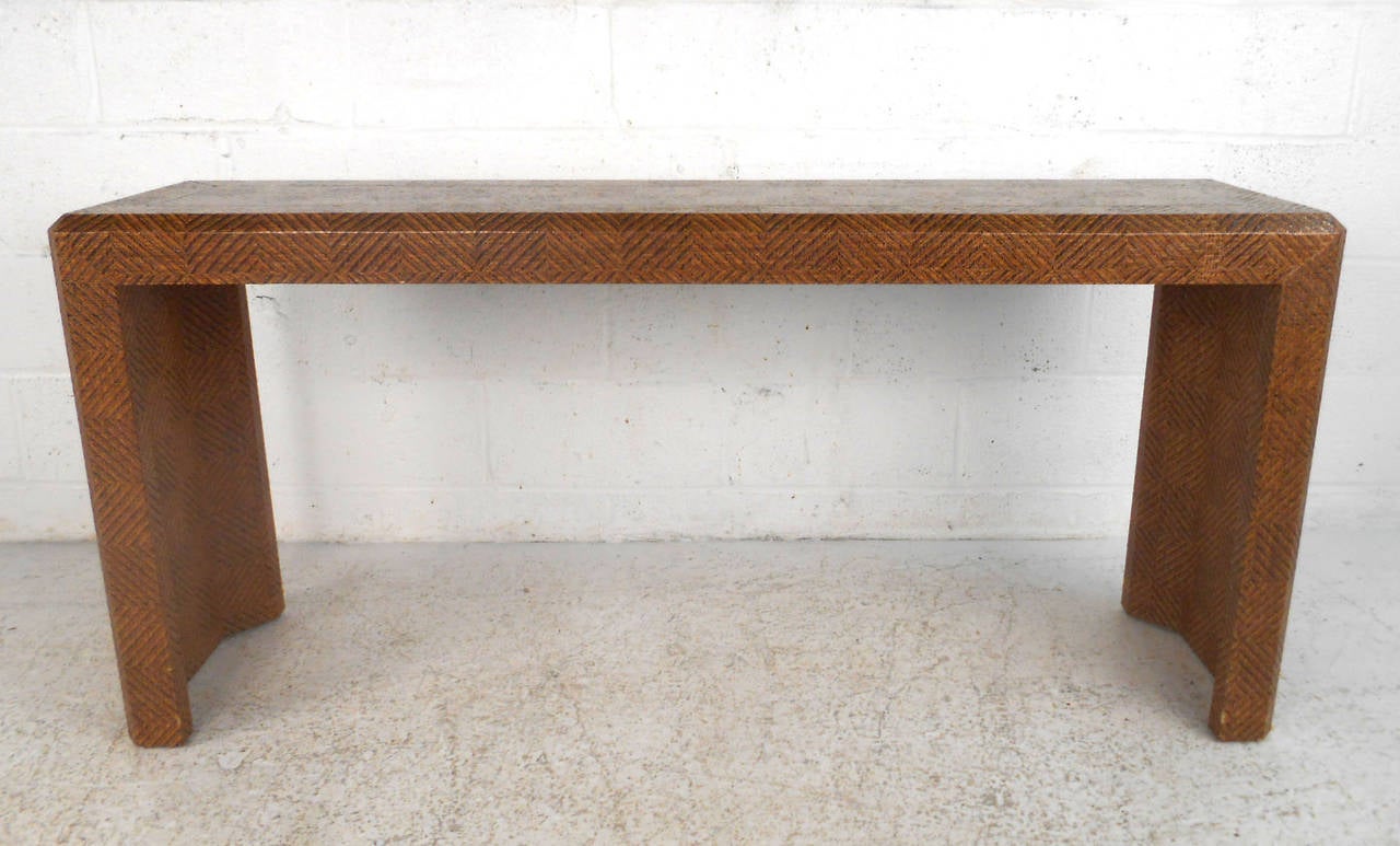 This unique vintage console table features a woven texture finish features a decorative brass inlay. Perfect for use in living room or hallway, please confirm item location (NY or NJ).