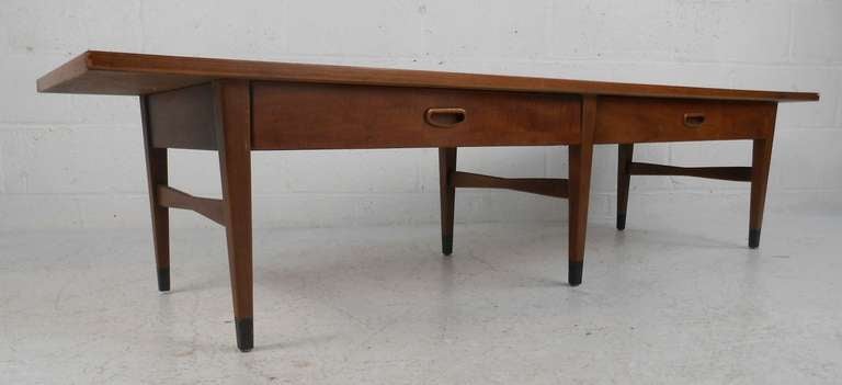 Two drawer coffee table by American of Martinsville. Please confirm item location (NY or NJ) with dealer.