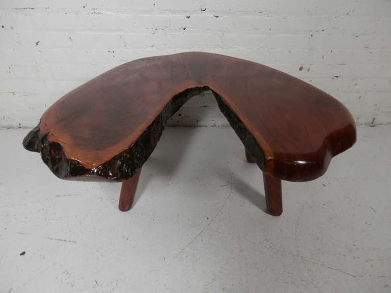 Vintage boomerang shape coffee table with live edge. Four legs and thick wood top.

(Please confirm item location - NY or NJ - with dealer)