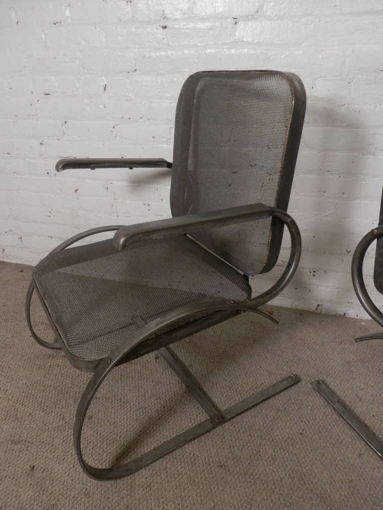 Pair Of Outdoor Spring Base Chairs In Striking Bare Metal Finish In Distressed Condition In Brooklyn, NY