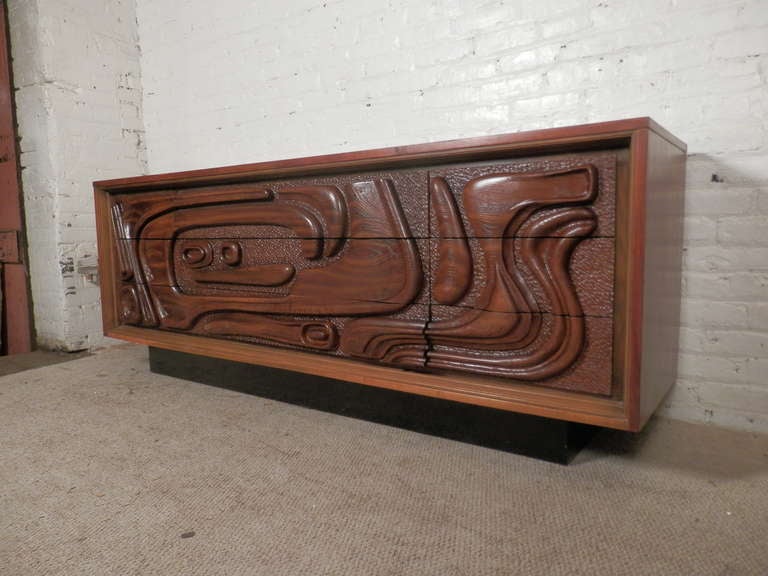 Tiki style nine drawer dresser from Witco. Polynesian inspired relief, three large middle drawers and six side drawers for plenty of storage.

(Please confirm item location - NY or NJ - with dealer)