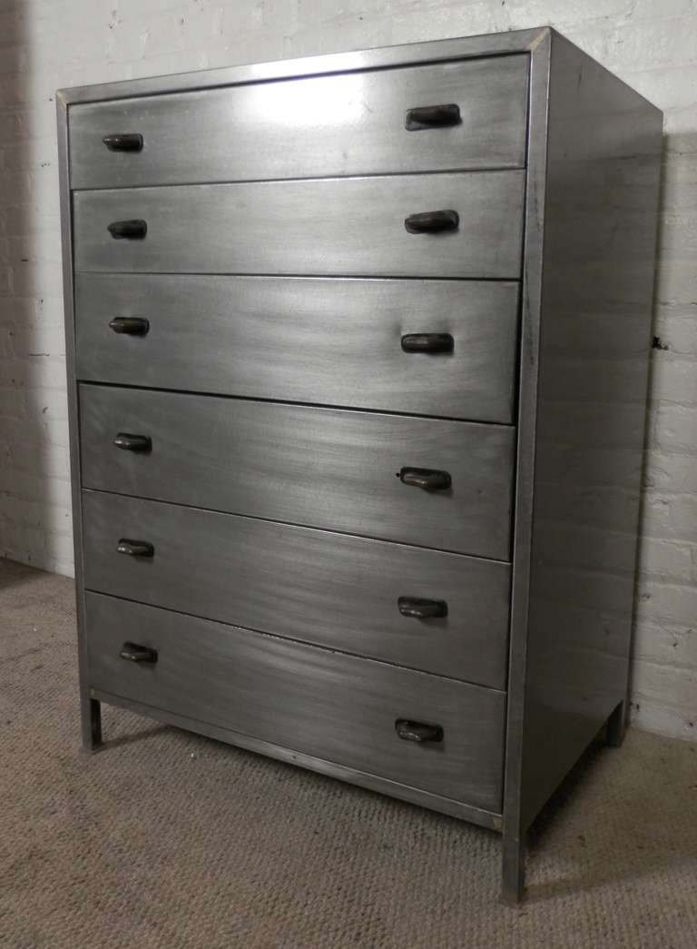 Six drawer striped metal dresser by the Simmons Company. Restored in a bare metal finish and lacquered for a stylish industrial modern look.

(Please confirm item location - NY or NJ - with dealer)