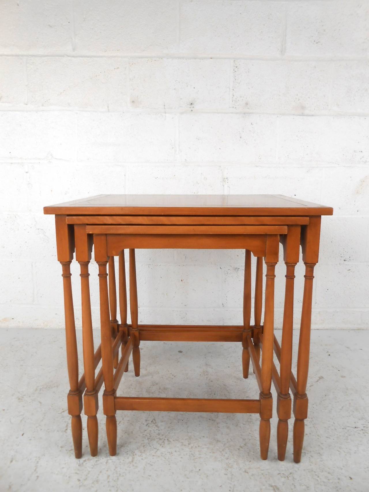 This unique set of three nesting tables feature a solid construction and beautiful teak finish which offer a perfect modern accent to any home or office space.  Please confirm item location (NY or NJ) with dealer.