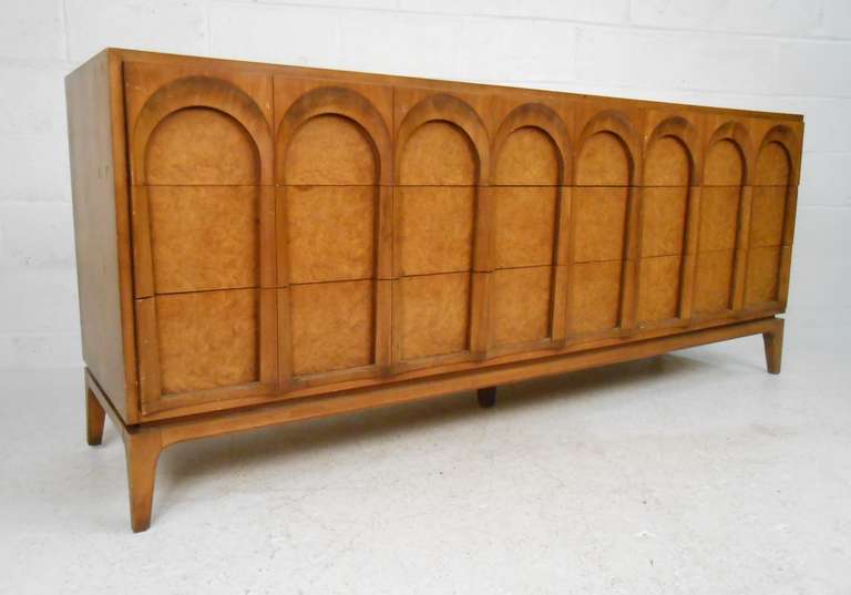 Mid century Thomasville nine drawer dresser with burled walnut drawer fronts. Please confirm item location (NY or NJ) with dealer.