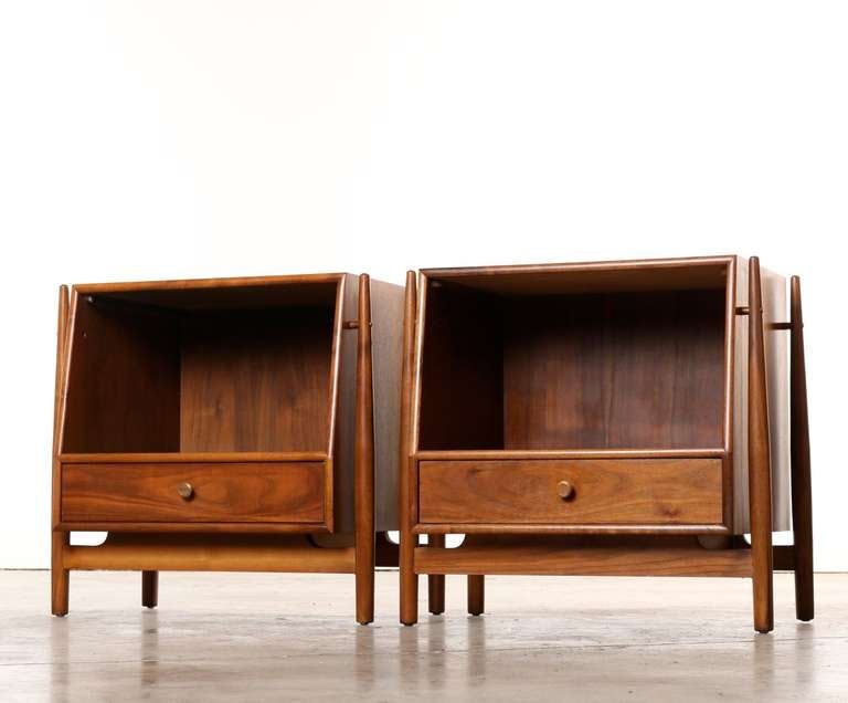 Solid construction with all the grace and style that makes mid century design so desirable. These side tables, designed by Kipp Stewart and Stewart McDougall for Drexel in the 1960s, are as practical as they are fashionable. We love the drawer and