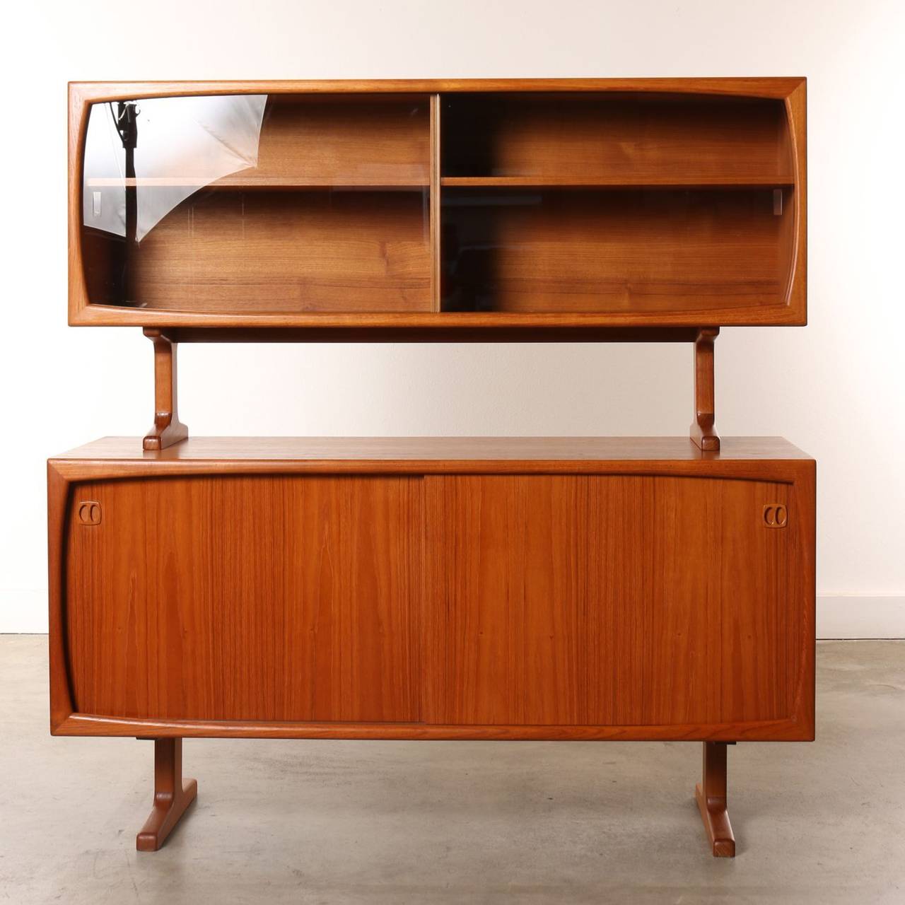 In addition to offering ample storage this credenza and removable hutch exhibits quality cabinetry.  Well constructed and finished on the back it offers an option to be used as a room divider. Float it cabinet in the center of a room, let it extend