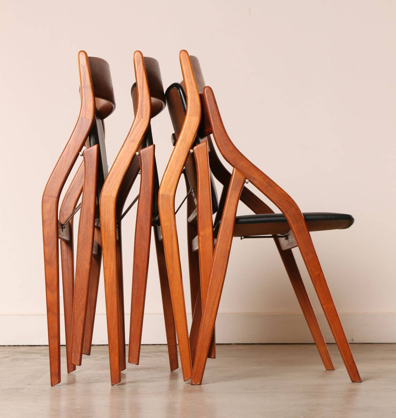 Scandinavian Modern Set of Four Dyrlund Danish Modern Teak Folding Dining Chairs