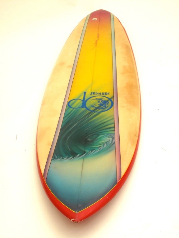 During the 1970s airbrushed surfboards were an art form unto themselves.  An expression of individuality in a multi-million dollar industry.  Imagine the cool factor of surfing on a one-off piece of art.  

Op Sunwear was started in the 1960s and