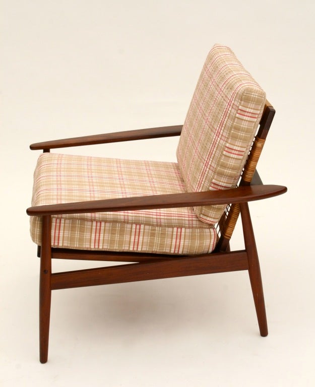 Hans Olsen 1950s Danish Rosewood and Cane Easy Chair.  Stunning lines and great comfort.