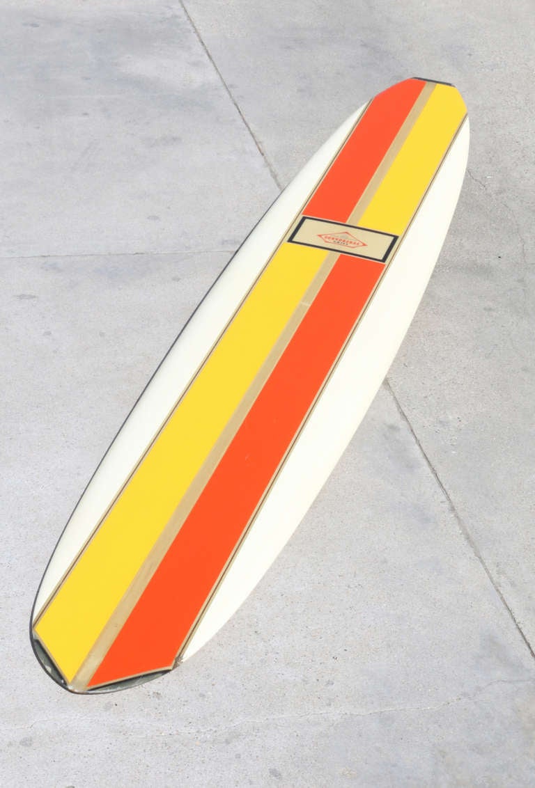 Measuring in at a massive 10 feet 4 inches this brilliant Mondrian colored board would look fantastic next to a piece of abstract art and will hold it's own on a clean white wall.

A spectacular find, this is an all original 1966 Jack's Surfboard