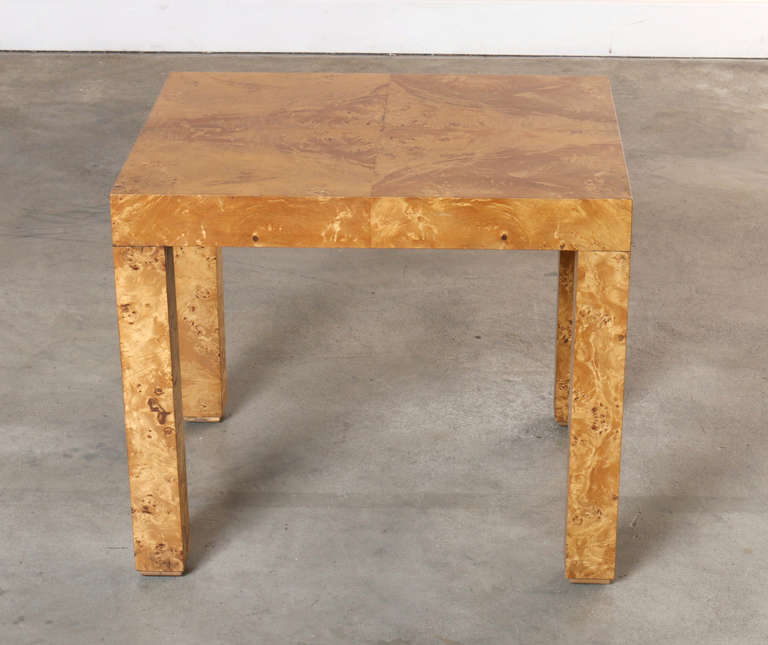 Great height, size, style and sensibility unite in this beautiful, book matched olive burl wood, side table by Milo Baughman for Thayer-Coggin.

This versatile design will marry with a variety of interior styles and purposes.   

Wear consistent