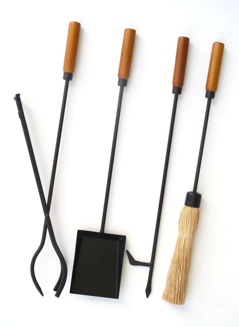 Clean, sleek and modern.  This vintage fireplace tool set is the perfect side-kick to the modernist fireplace.  Palm Springs modern  or New York loft, these tools will certainly find themselves at home.  
Never used, nearly new condition.
Set