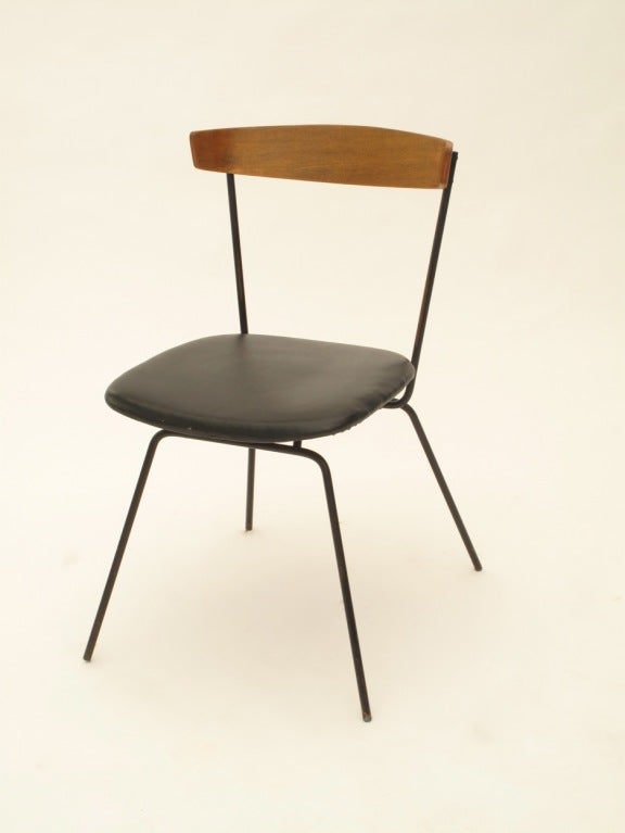 This Clifford Pascoe chair has clean lines, an open airy design and is surprisingly comfortable because the metal has just enough give to give you a bit of bounce when leaning back.

We are great fans of Post War Design (that's WWII, we're talking