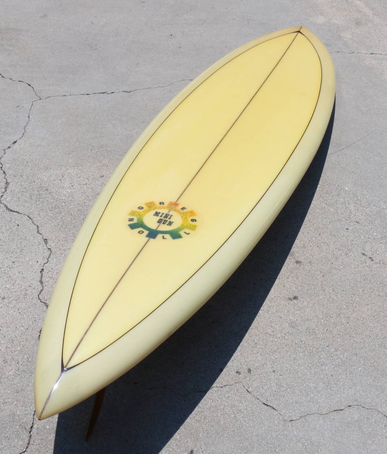 At first glance the untrained eye might just see a plain colored surfboard - but we want to tell you that this Sprocket Logo Mini Gun by Greg Noll is an outstanding icon of the shortboard revolution. It's all original, unrestored and bears the