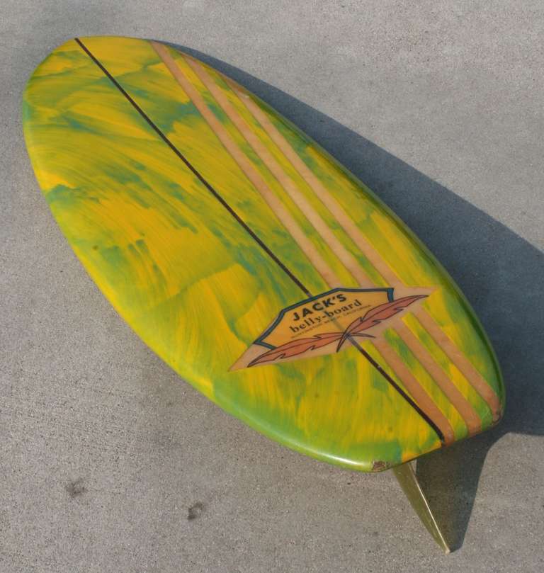 This is an original acid splash designed bellyboard with three competition stripes and a redwood stringer and a 6