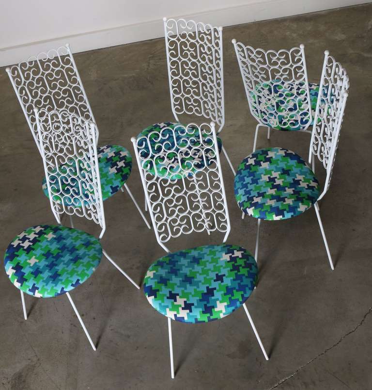 Set of 6 wrought iron matching (and comfortable) high back chairs; perfect for the patio or garden. Made with quality hand hammered wrought iron craftsmanship, the chairs have been sandblasted, powder-coated/painted painted white and the seats have