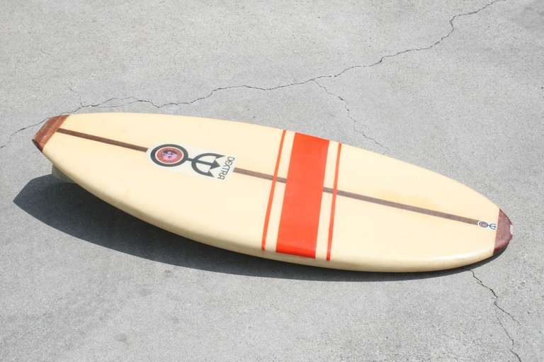 This 1960's Dextra Belly Board has the look of a larger surfboard of the era but at a quarter of the size, it is the perfect way to bring 