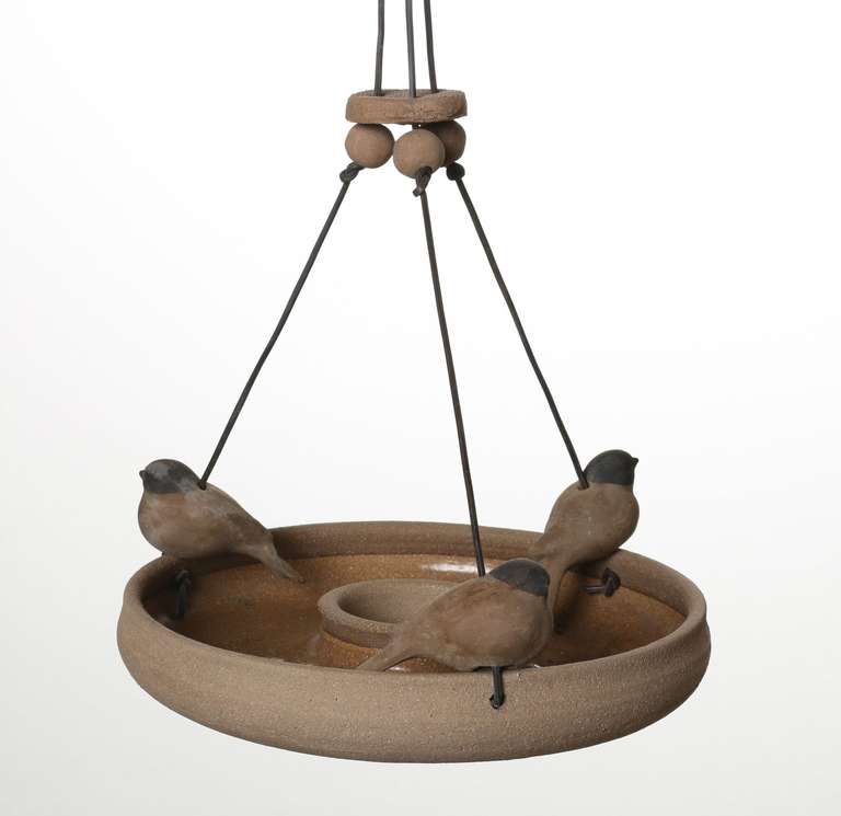 This bird feeder was made by Hans Stumpf, of a design attributed to Stan Bitters.  Stunning in its simplicity.  Exceptional in its quality.  

Stan Bitters' career in ceramics has spanned six decades. In 1959 Stan Bitters went to work for Hans