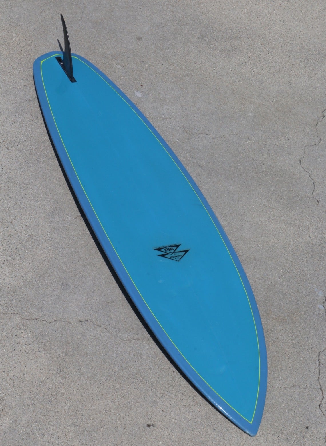 This surfboard is an exquisite representation of 1970 surfboard innovation. Made during a rare moment in time, during the transitional surfboard production period and on the cusp of the shortboard revolution, when surfboard design innovation was
