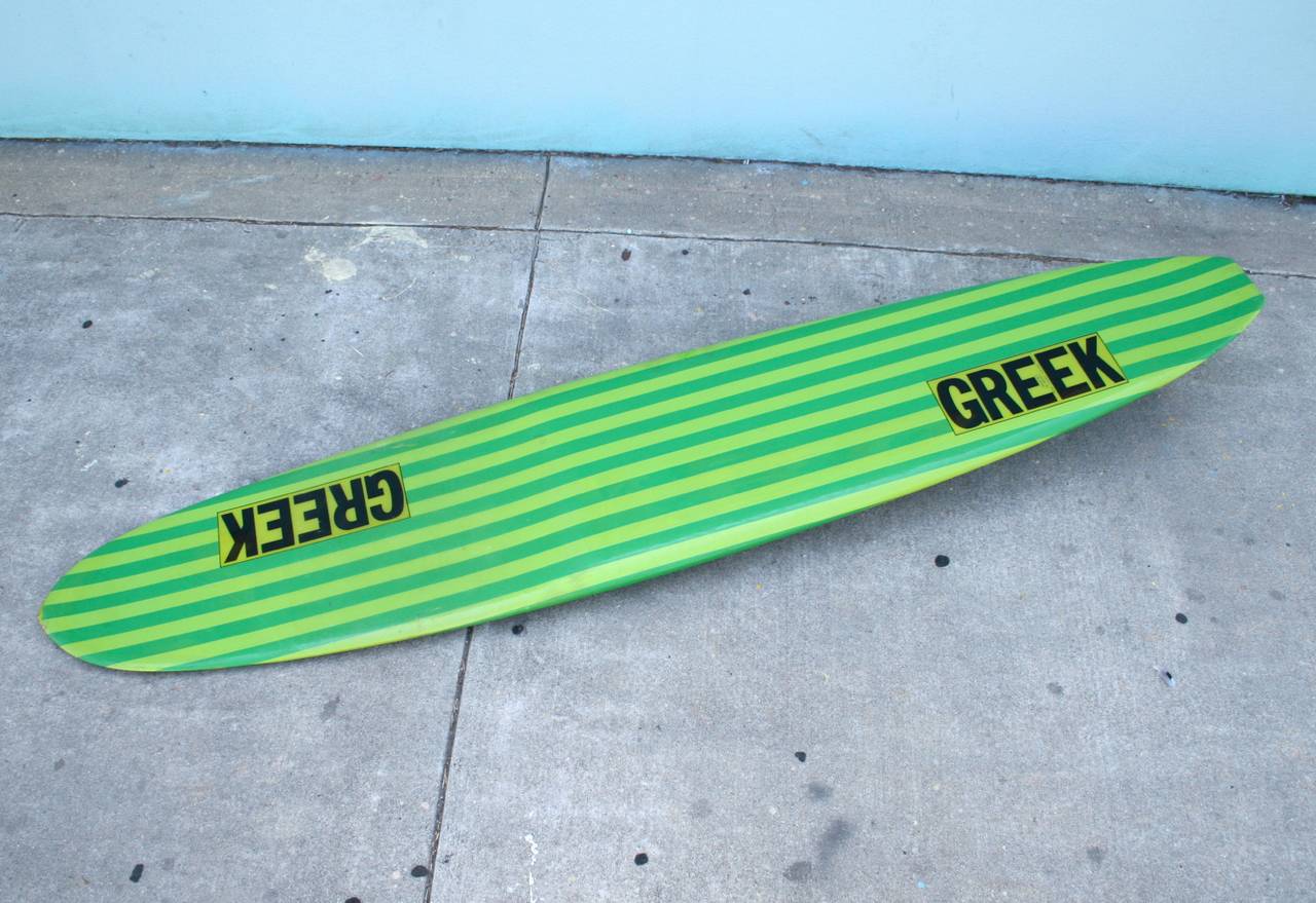 Vivid green stripes, a board shape unique to the era, a fabulous fin and a fair amount of zing make this 1977 