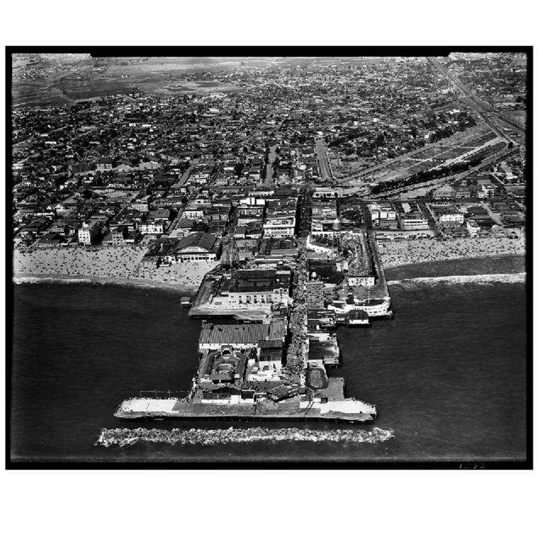 Rare aerial photo taken in the 1930s of the original Venice Beach California Pier. This is a limited edition, original black and white photographic print on archival photo paper.  This contemporary print has incredible detail as it was taken from an
