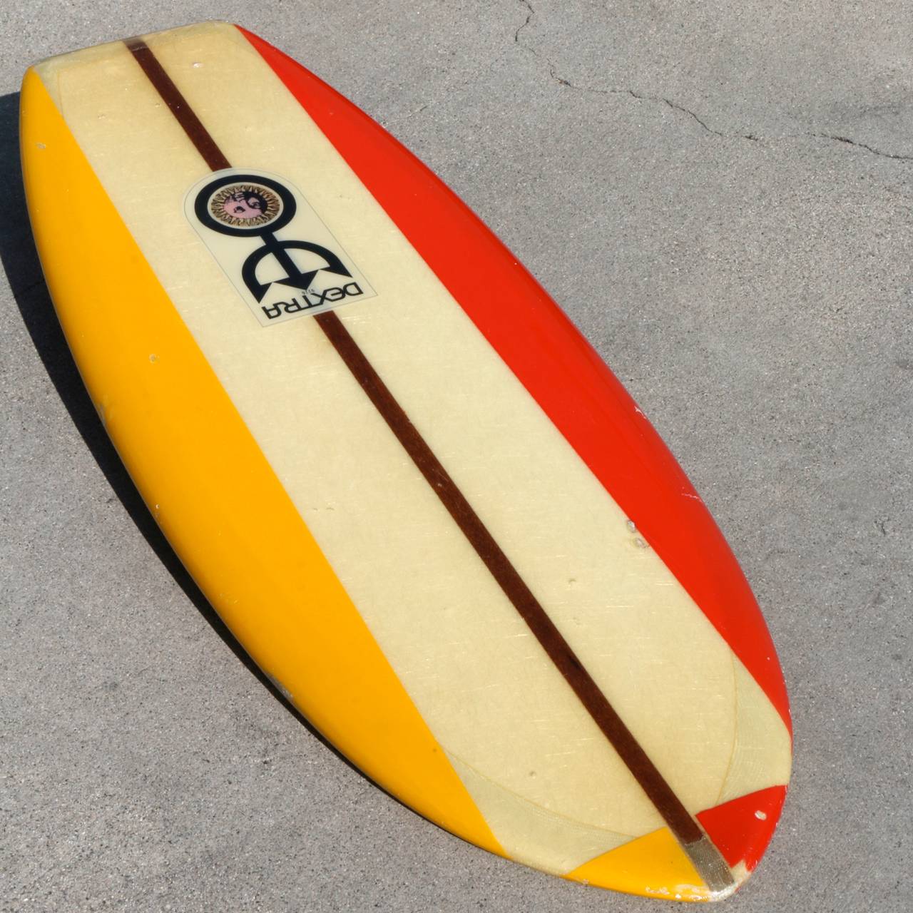 This 1960s Dextra Belly Board was made at the height of the longboard era to have the look of a traditional surfboard of the day at a quarter of the size. The perfect way to bring Classic authentic 1960s surf aesthetic into a home or office without