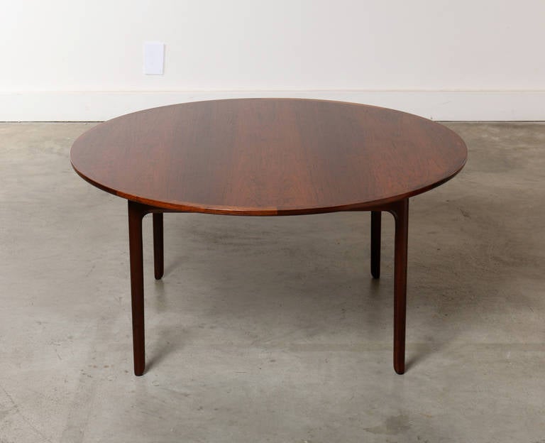 The stunning grain of the rosewood top on this table stops us in our tracks.  It's startlingly beautiful.  The elegant form was designed by Professor Ole Wanscher Denmark 1950s this table is European height making it ideal for the living room,