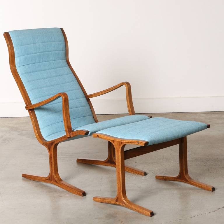 Comfortable, unique, cool - better yet this vintage Heron Lounge Chair and Ottoman set has been reupholstered and is in excellent condition.  The seat is supportive, the fabric is clean, the wood is solid and the piece - simply