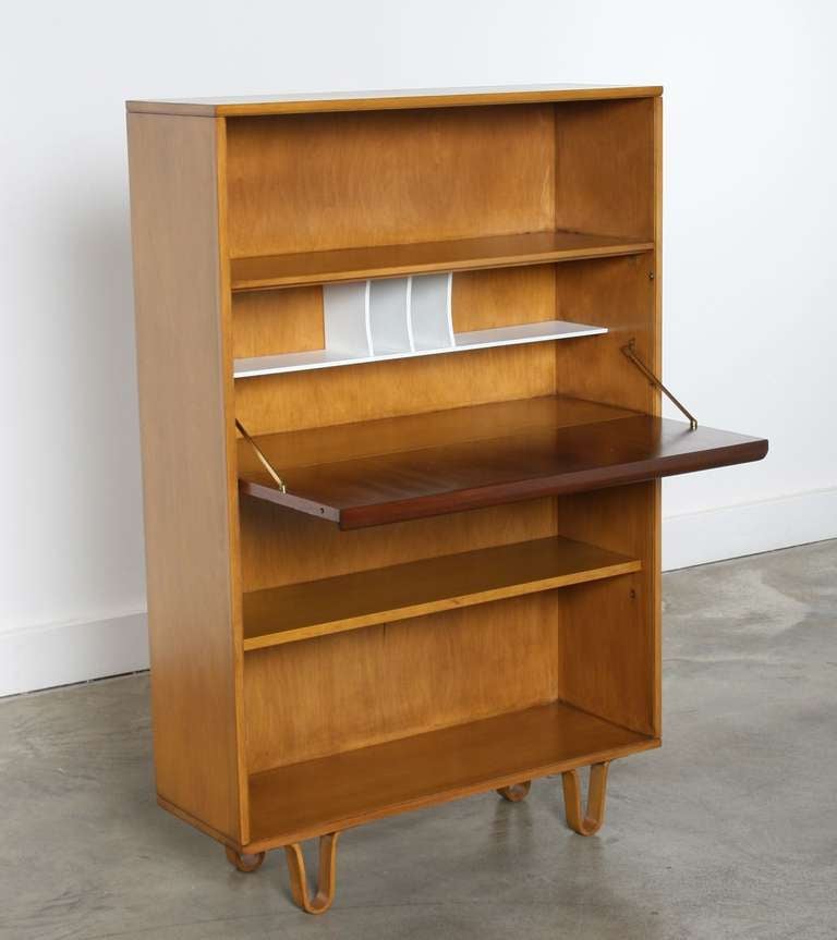 This unique piece of furniture was designed by Dutchman Cees Braakman in 1954 for UMS Pastoe Netherlands.
Constructed of birch wood and rosewood It has a hidden desk that opens to reveal a beautiful white interior shelf for letters and office