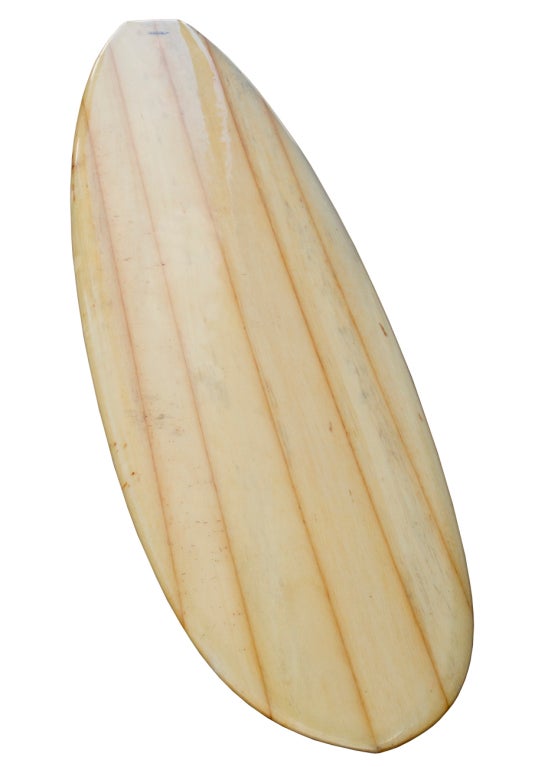 This beautiful Hobie Balsa semi-gun surfboard has 1960s lines but was made in the 1970s for a Hobie retro advertising photo-shoot. This surfboard looks to be un-ridden and is in excellent condition, apart from a few impact blemishes. It displays