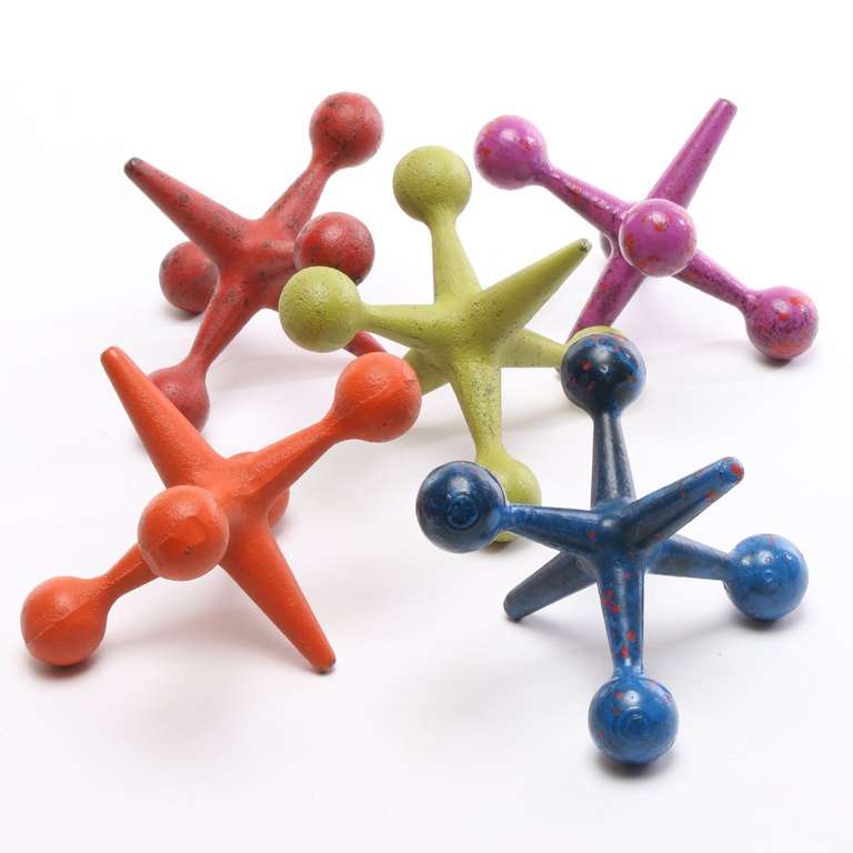 This very fun Pop Art Sculpture Jack Set was designed by Bill Curry in 1968 as a bookend set for his Design Line Company. Set of 5, 6 inch, 3 lb cast iron multicolored Jacks.

Red, Green, Blue, Orange, Purple.

American designer William 