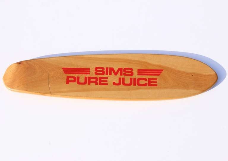 It's rare to find a 1970's skateboard deck by such an important maker in virgin condition, not yet drilled for wheels, and never used.  This Sims Pure Juice skateboard deck features a block kick-tail (a technique used prior to the introduction of