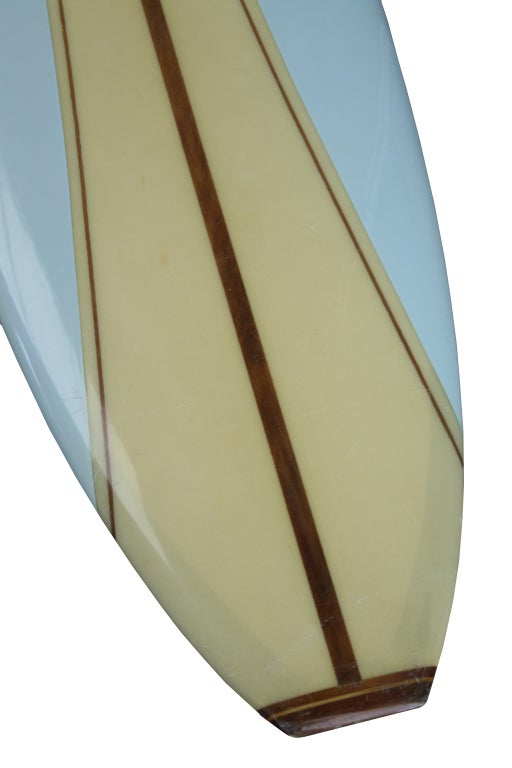 This Greg Noll Surfboard is in all original un-restored near mint condition. In eggshell blue and clear foam.  1