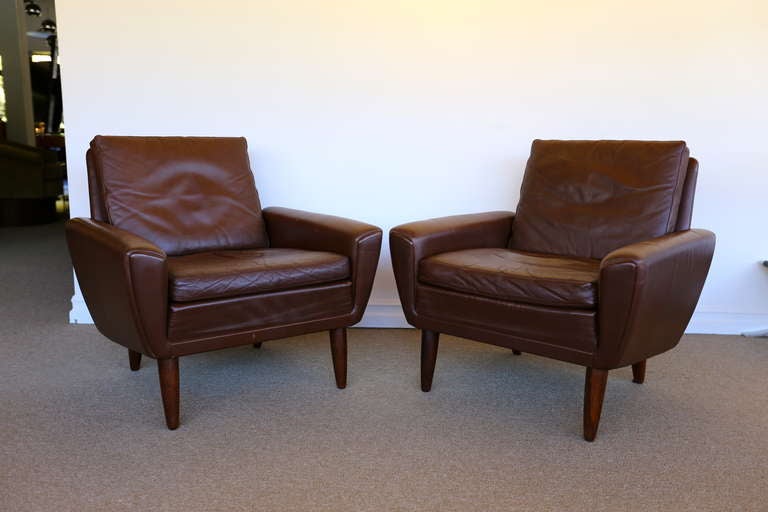 Pair of leather and rosewood lounge chairs by  G.Thams for A/S Vejen.