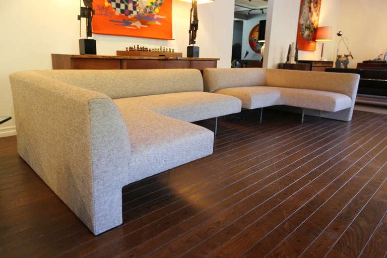 Omnibus Sectional by Vladimir Kagan for Directional.  Consisting of two pieces.  Excellent restored condition.  Lucite legs Let the sofa appear to float.