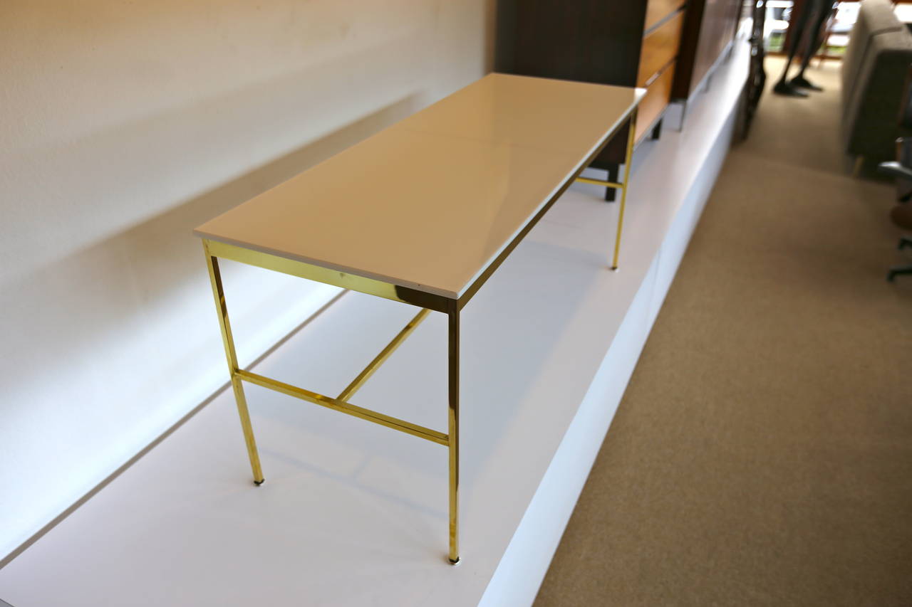 American Polished Brass and Vitrolite Console Table by Paul McCobb