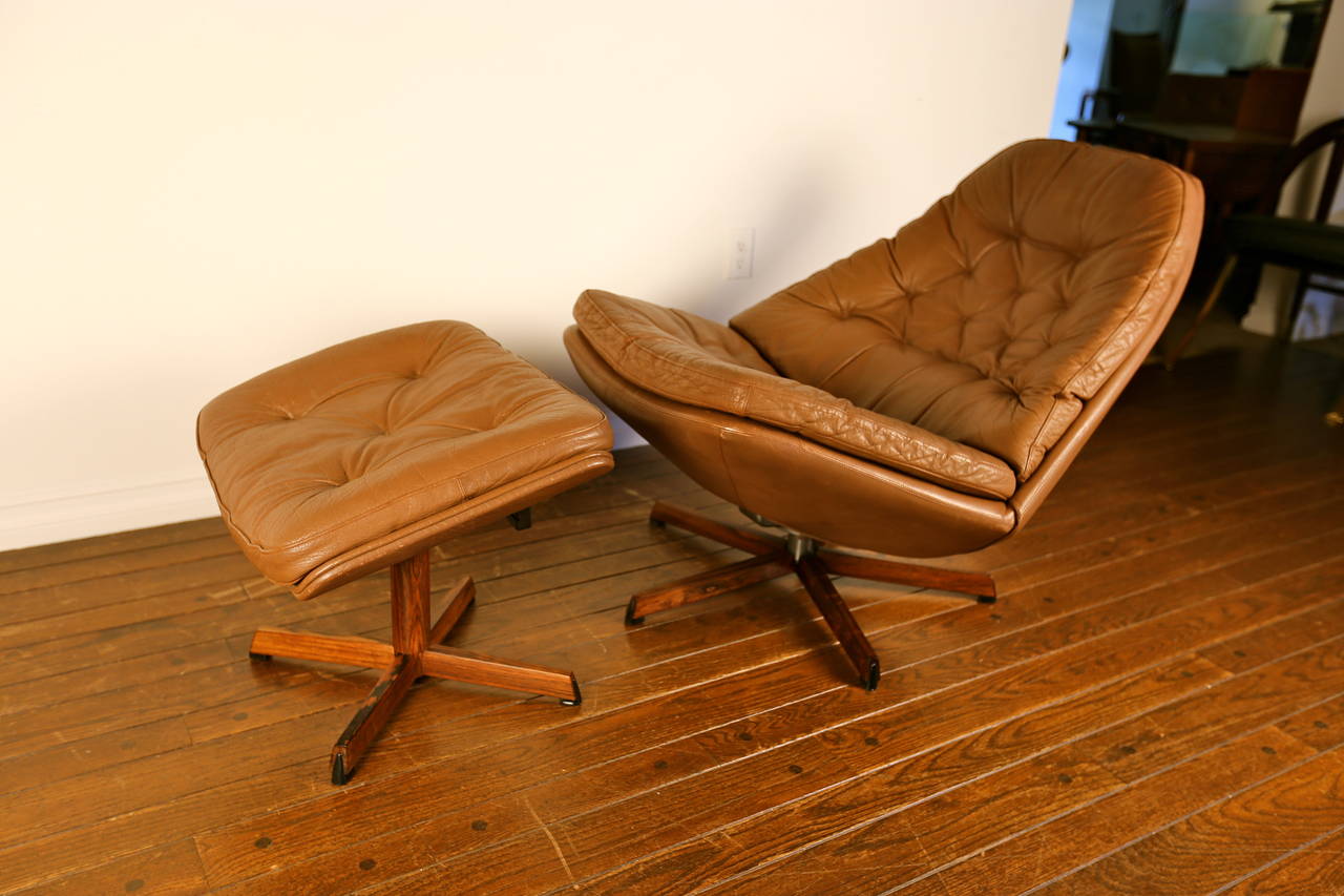 Leather Lounge Chair & Ottoman by H.W. Klein.  The chair and ottoman adjust and lock into the desired position for lounging.