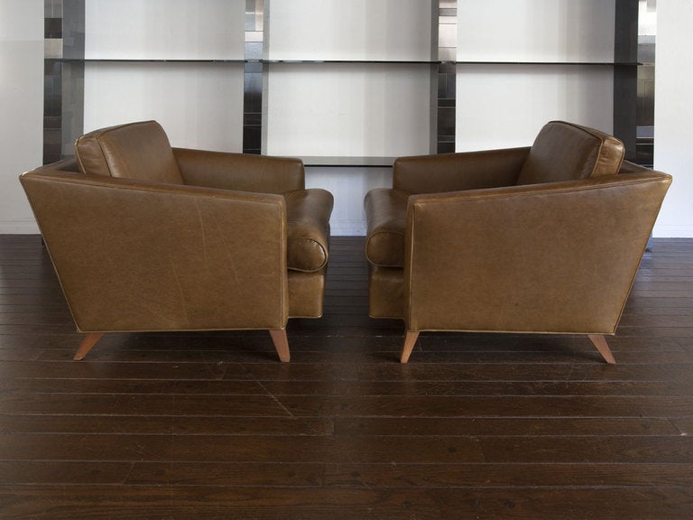 Pair of leather lounge chairs by J.WANAMAKER INC.