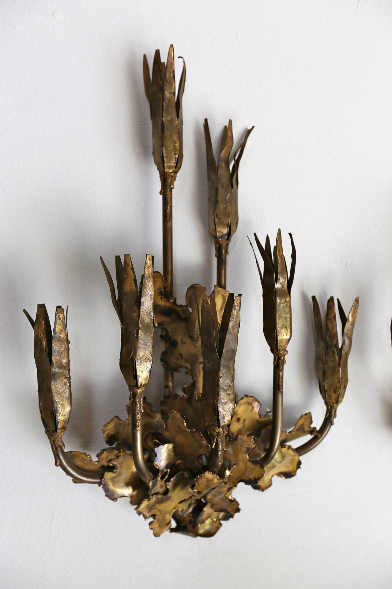 Pair of brutal torch cut sconces by Tom Greene.