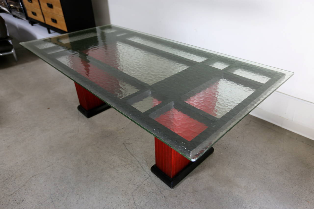 glass top dining table with pebbles