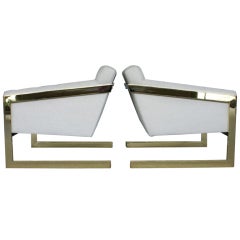Pair of brass framed and tufted cantilevered lounge chairs by Milo Baughman
